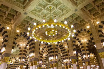 Interior of Masjid (mosque) Nabawi in Al Madinah, S. Arabia. Nabawi mosque is the 2nd holiest...