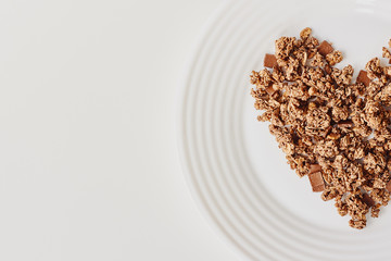 Cereal muesli breakfast on white background. Healthy eating and lifestyle concept