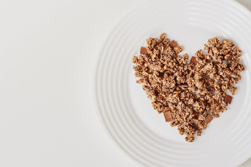 Cereal muesli breakfast on white background. Healthy eating and lifestyle concept