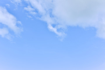 blue sky with clean white clouds for background.