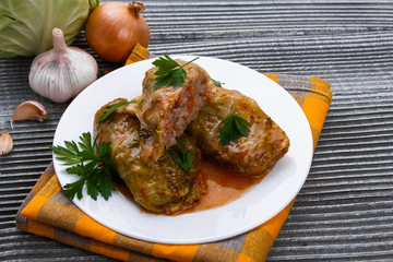 cabbage rolls on a wooden gray rustic background
