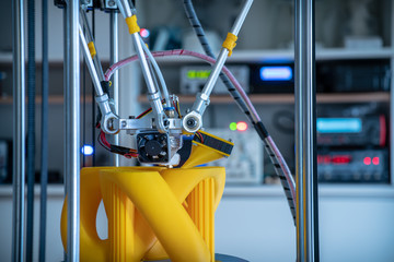 Print parts on a delta 3D printer in industrial lab