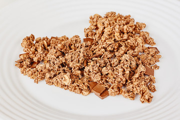 Cereal muesli breakfast on white background. Healthy eating and lifestyle concept