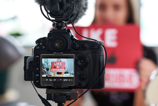 Camera showing vlogger recording content for daily vlog