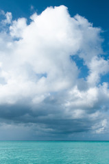 Naklejka na ściany i meble Clouds over Indian Ocean. Dramatic sky