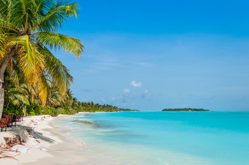 Fototapeta na wymiar Beach degradation. Maldives will be washed away. Climate change evidence