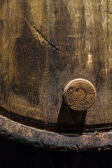 Cork of a wooden porto wine barrel in wine cellar of Porto, Portugal.