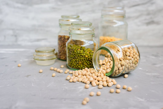 Variety of beans in glass jars