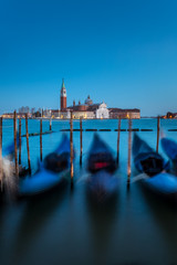 San Giorgio Maggiore church and gondolas at twilight in Venice, Italy.