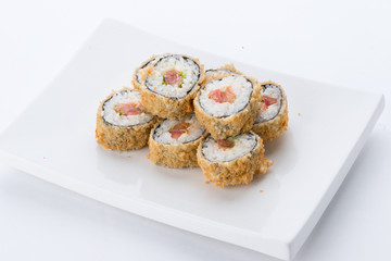 Sushi set and composition at white background. Japanese food restaurant, sushi maki gunkan roll plate or platter set.