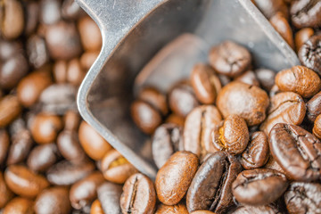 coffee beans with metal scoop
