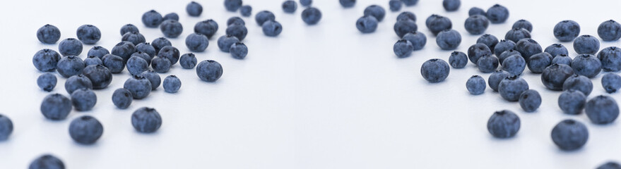 Blueberries and cranberries, berries on a white background. Berry light background.