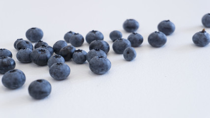 Blueberries and cranberries, berries on a white background. Berry light background.