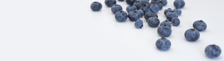 Blueberries and cranberries, berries on a white background. Berry light background.