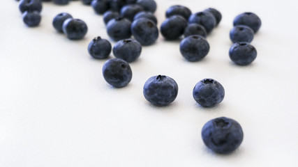 Blueberries and cranberries, berries on a white background. Berry light background.