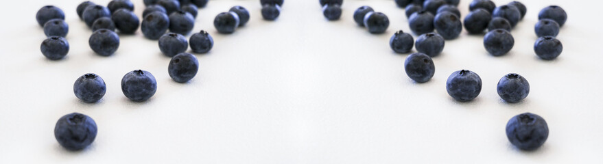 Blueberries and cranberries, berries on a white background. Berry light background.