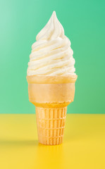 studio shoot of ice cup on yellow and green background