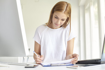 Young woman working from home