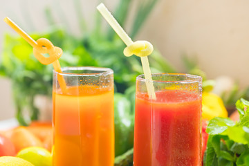 Two glasses of fresh fruit and vegetable smoothies