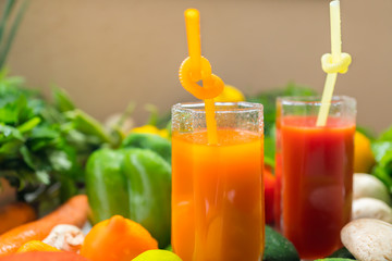 Two healthy vegetable smoothies in tall glasses