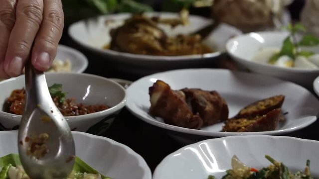Hands eating set of Northern Thai food together video