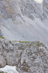 Three mountaineers traveler make a challenge to the mountain