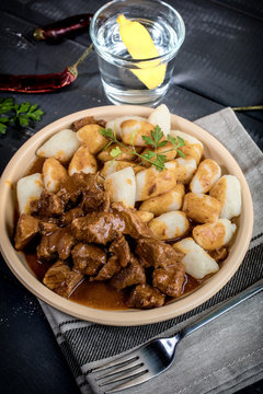 Beef stew with potatoes dumplings.