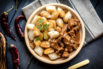 Beef stew with potatoes dumplings.