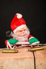 Santa trying to climb the wall, a concept on immigration policies.