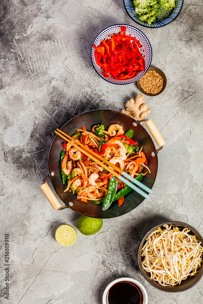 Wall mural stir fry with prawns, vegetables, soy sause and sesame