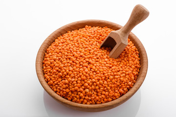 raw lentils on a white acrylic background