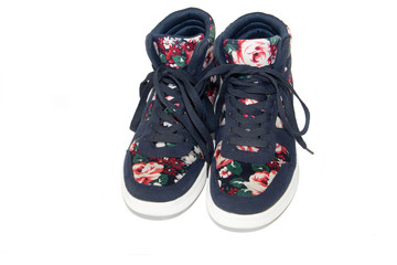 Female gym shoes on a white background