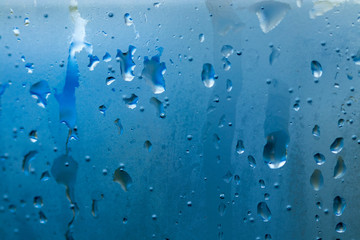 beautiful natural water drop on glass close up