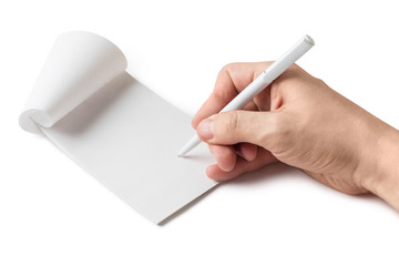Close-up view of a male hand writing or drawing smth. with a simple pencil into empty notepad, isolated on white background