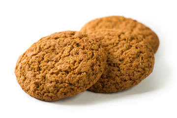 Three oatmeal cookies, shot with a low depth of field, isolated on white background