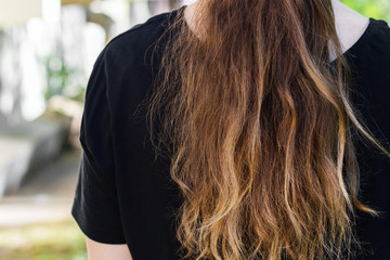 Long messy fragile women hair back look