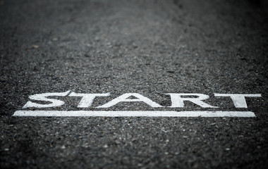 Start letters on asphalt floor with vignette mood and toon, selective focus.