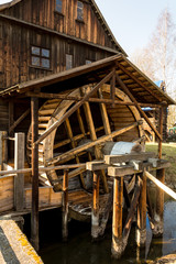 A wooden water mill.