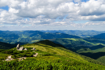 dangerous path in the high mountains against the blue sky