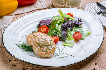 chicken cutlets with mixed salad