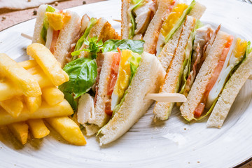 club sandwich with fries