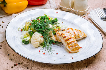 Fried chicken breast with broccoli