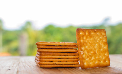 Biscuits crackers on wooden table. selective focus.