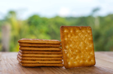 Biscuits crackers on wooden table. selective focus.