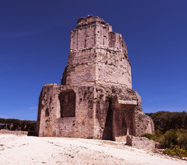 The Roman Tour de Magne, or Magne Tower, in the Jardin de la Fontaine in Nimes. Gard, Provence,...