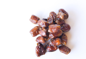 dried dates isolated on white background. selective focus.