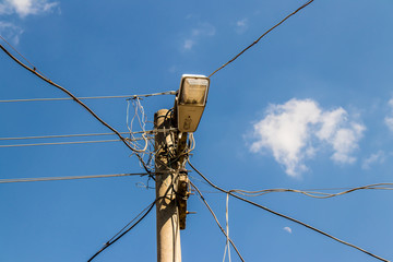 a good looking portrait from street lamp with cloudy sky
