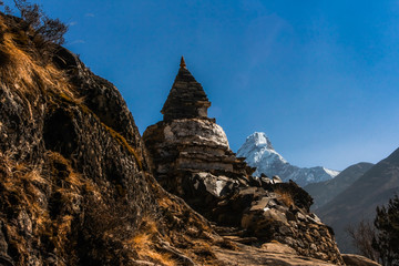 Buddhist stupa along the trail to Dingboche (Pangboche) and Ama Dablam mount in the background