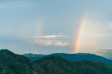 Double rainbow in the evening at khao kho phetchabun thailand