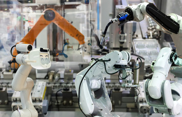Robot replacement Industrial 4.0 of things technology robot future arm and man using controller for control electronic